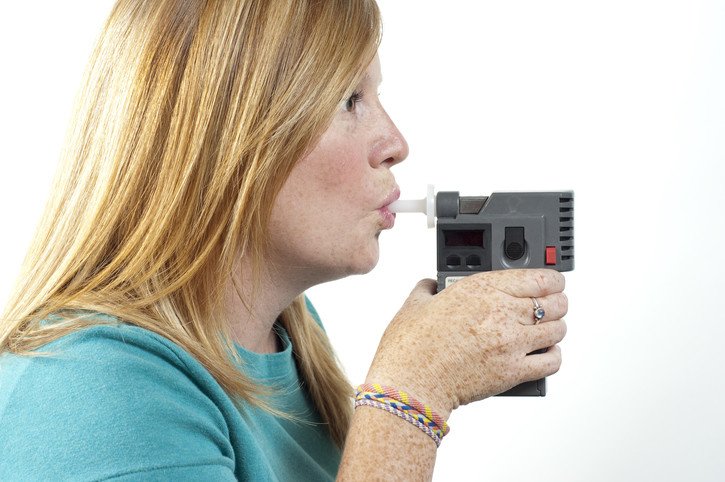Woman taking an Alcohol EBT