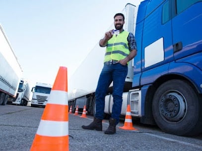 student driver next to a truck